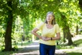 A retired woman on a run has severe pain in the abdomen