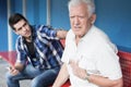 Retiree with chest pain Royalty Free Stock Photo