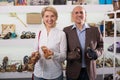 Retiree couple shopping for shoes