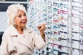 Retiree looking for new eyeglasses Royalty Free Stock Photo