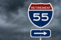 Retirement at 55 ahead message on USA highway sign Royalty Free Stock Photo