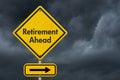 Retirement Ahead message on warning road sign with stormy sky