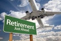 Retirement Green Road Sign and Airplane Above