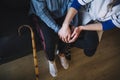 Retirement home concept with nurse woman holding hands. High quality and resolution beautiful photo concept Royalty Free Stock Photo