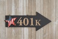 Retirement 401k message on arrow sign with a USA flag stars and stripes star