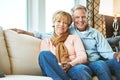 Retirement, love and portrait of old couple on sofa for bonding, healthy relationship and marriage. Happy, home and