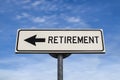 Retirement road sign, arrow on blue sky background Royalty Free Stock Photo