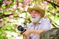 Retirement travel. Photography courses. Travel and tourism. Capturing beauty. Happy grandfather. Spring holidays. Travel