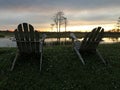 retirement and two chairs looking at the sunset in the swamp Royalty Free Stock Photo