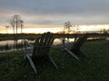 retirement and two chairs looking at the sunset in the swamp Royalty Free Stock Photo