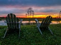 retirement and two chairs looking at the sunset in the swamp Royalty Free Stock Photo