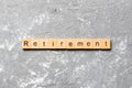 Retirement word written on wood block. retirement text on cement table for your desing, concept Royalty Free Stock Photo