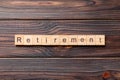 retirement word written on wood block. retirement text on cement table for your desing, concept Royalty Free Stock Photo