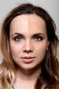 Retouch - face of beautiful young woman before and after. Royalty Free Stock Photo