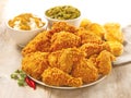 Retouched image of cruncy fried chicken meal