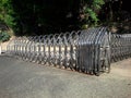 Retractable Stainless Steel Barrier Fence with Casters installed as a temporary fence, ready for use.