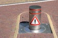 Retractable street bollard