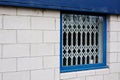 Retractable window security gates