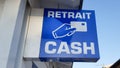 Retrait cash means in french square shape ATM sign in street Royalty Free Stock Photo