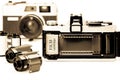 Retro 35mm camera with film opened back side. Royalty Free Stock Photo