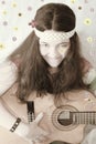retro 60s teen girl guitar Royalty Free Stock Photo