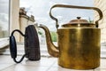 Retro aeneous teapot and cast iron Royalty Free Stock Photo