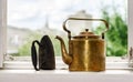 Retro aeneous teapot and cast iron Royalty Free Stock Photo