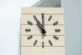 Retro-style alarm clock showing five minutes to twelve Royalty Free Stock Photo