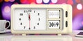 Retro alarm clock year change from 2018 to 2019, midnight, on festive, bokeh background. 3d illustration