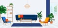 Retro armchairs and colorful pillows on a navy blue sofa in a vibrant living room interior with green plants. Royalty Free Stock Photo