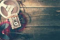 Retro audio reels and cassette on wooden table with copy space