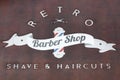 Retro barbershop sign on wall