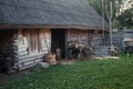 Retro barn with thatched roof and a backyard Royalty Free Stock Photo