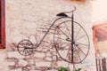 Retro bicycle as element of exterior decoration in old earopean town