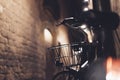 Retro bicycle in the night old city on background bokeh light flare in night architecture, vintage bike in evening street Royalty Free Stock Photo