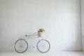 Retro bicycle on roadside with vintage brick wall background Royalty Free Stock Photo