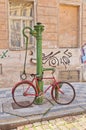 Retro bike near old water-pump in Prague Royalty Free Stock Photo