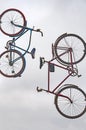 Retro bikes soaring in the clouds.