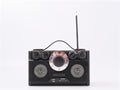 Retro black radio receiver with antenna and speakers Royalty Free Stock Photo