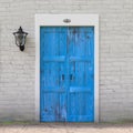 Retro Blue Door in Old Grunge White Brick Wall with Vintage Iron Lantern. 3d Rendering Royalty Free Stock Photo