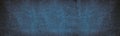 Retro blue wide rough concrete wall panoramic texture. Wide cement with pebble. Abstract dark large background