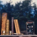 Retro books and photo camera on a glass shelf in the closet, close-up Royalty Free Stock Photo