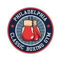 Retro boxing emblem with red boxing gloves