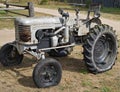 Retro broken Russian wheel tractor HTZ brand