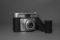 Retro camera- photographer- white and black