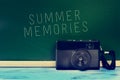 Retro camera and the text summer memories, filtered Royalty Free Stock Photo