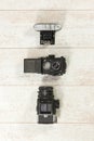 Retro Cameras With Flash On Floorboard