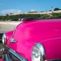 Retro car and Cabana castle in Havana Cuba