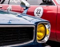 Retro car festival. Retro car headlight. Fragment of the front of a retro car. Royalty Free Stock Photo