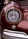 Retro car festival. Retro car headlight. Fragment of the front of a retro car. Royalty Free Stock Photo